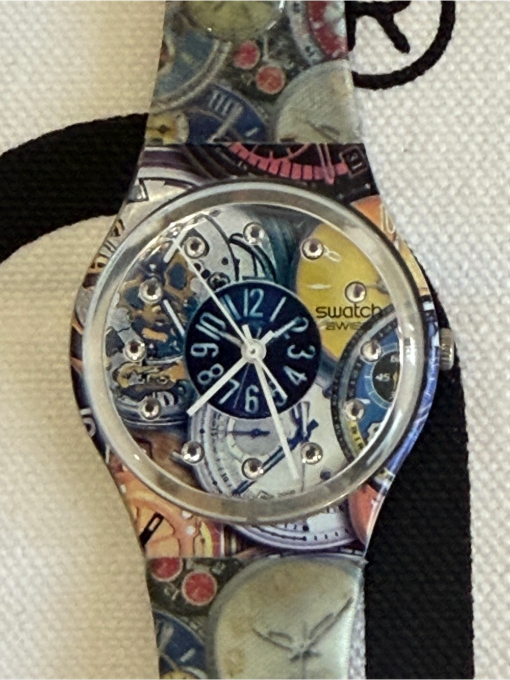 Swatch Gent watch model
GE216 named "Timespective,"by artist Manish Arora.
